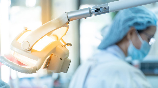 Close up of dental operatory light in dental clinic at Peak Endodontics in Covington, WA